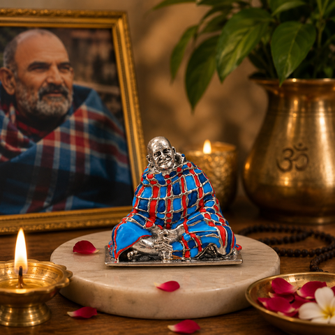 Neem Karoli Baba Murti with Blue and Red Shawl in Devotional Setting