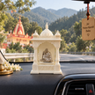 Compact Neem Karoli Baba idol with white resin mandir displayed on a car dashboard