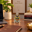Khatu Shyam Ji brass murti with silver finish styled in a home devotional setting