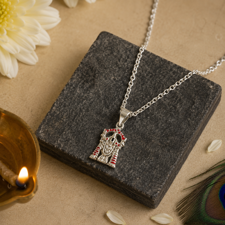 Tirupati Balaji pendant in brass silver finish with red enamel temple design on dark stone with white chrysanthemum flower and diya