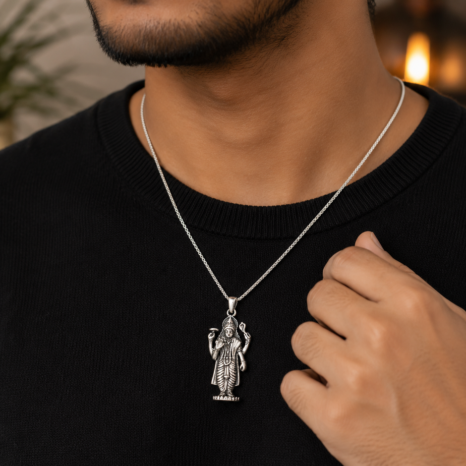 Lord Vishnu Ji pendant in brass silver finish worn by man in black t-shirt showing pendant styled for daily devotional wear