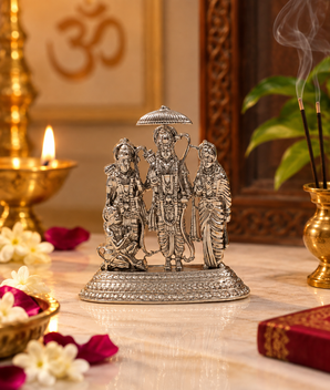 Silver finish Ram Darbar idol with Lord Ram, Sita, Lakshman and Hanuman displayed in a traditional home temple with diya and flowers – My Guru Ji