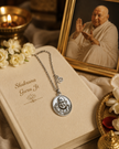 Shukrana Guru Ji Pendant with Chain made of brass with silver finish featuring Bade Mandir Wale Guru Ji and Om charm for daily spiritual wear.