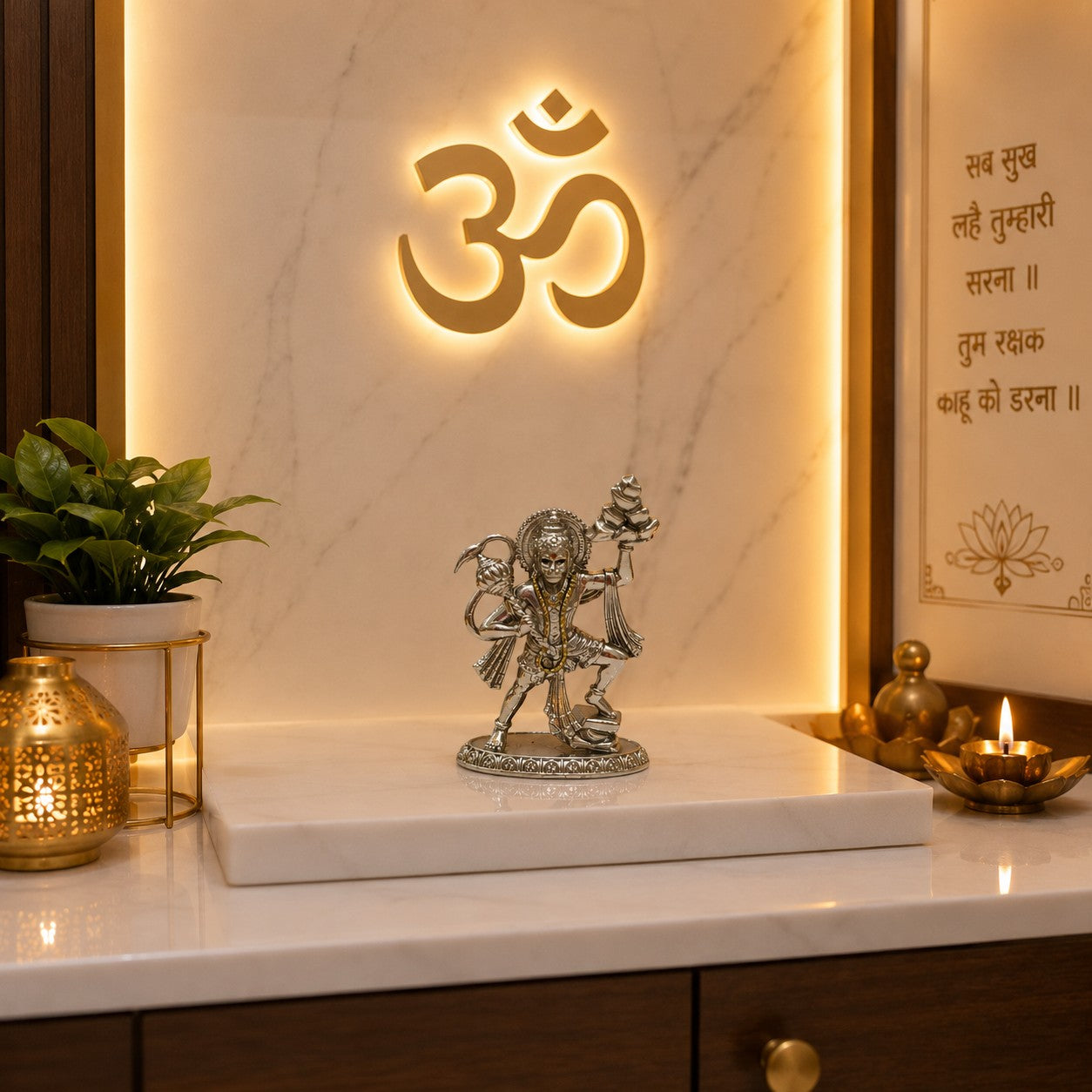My Guru Ji silver finish brass Hanuman idol carrying Sanjeevani mountain on a marble home temple altar with Om symbol