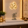 My Guru Ji silver finish brass Hanuman idol carrying Sanjeevani mountain on a marble home temple altar with Om symbol