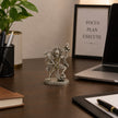 My Guru Ji silver finish brass Veer Hanuman Ji idol carrying Sanjeevani mountain on an office desk