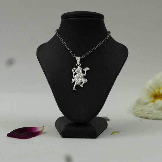My Guru Ji silver-finish brass pendant featuring Lord Hanuman carrying the Sanjeevani mountain on a display bust.
