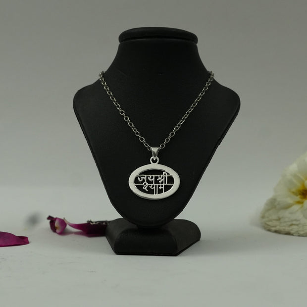 My Guru Ji oval Jai Shree Shyam pendant in silver finish featuring Hindi devotional text on a black display bust