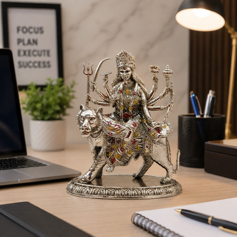 My Guru Ji brass Maa Durga idol with silver finish, featuring intricate details, seated on a lion for home or office.