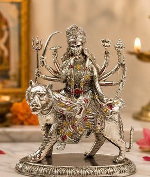 My Guru Ji brass Maa Durga idol with silver finish, featuring intricate details of the goddess seated on her lion.