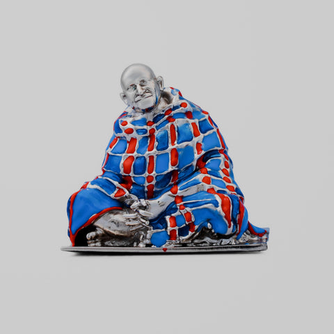 My Guru Ji Neem Karoli Baba brass idol with a hand-painted red and blue blanket in a silver finish