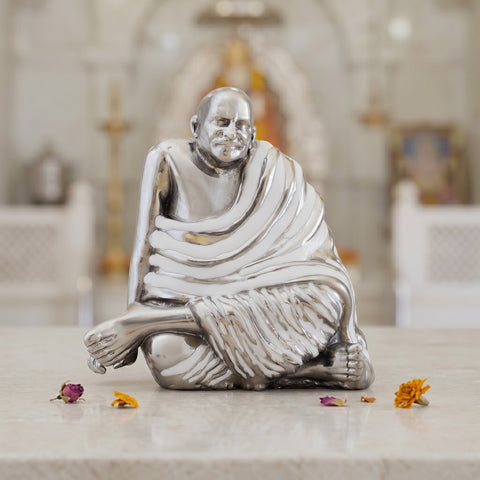 My Guru Ji handcrafted brass Neem Karoli Baba idol with antique silver finish and white detailing for meditation