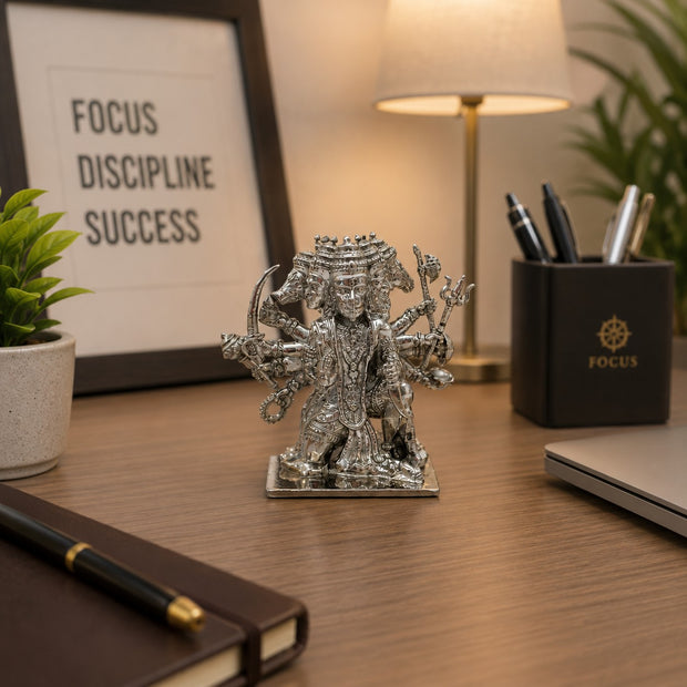My Guru Ji Panchmukhi Hanuman idol in premium brass with a silver finish, displayed on an office desk for protection.