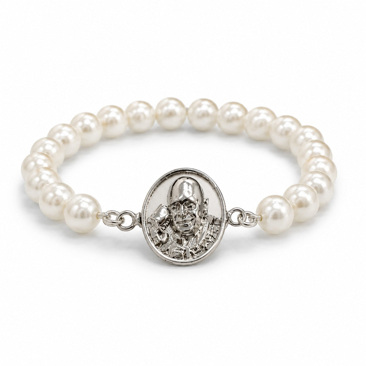 My Guru Ji pearl bracelet featuring a silver-finish brass Guru Ji charm on a stretchable white bead band.