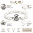 My Guru Ji pearl bracelet featuring a silver-finish brass charm of Guru Ji and lustrous white beads on a stretch band.