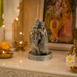 My Guru Ji Radha Krishna idol in premium brass with a silver finish, featuring intricate detailing on a home altar.
