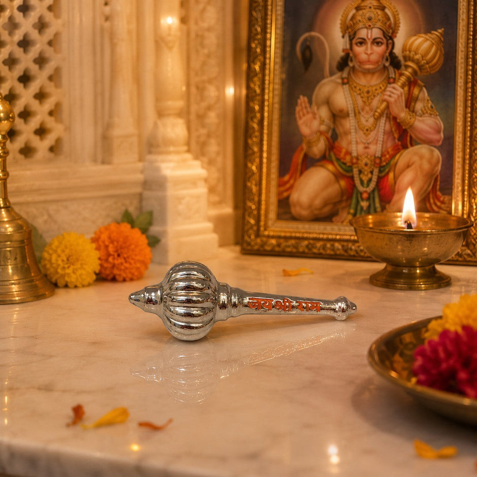 My Guru Ji silver brass Hanuman Gada with Jai Shri Ram engraving on a marble temple surface with a Lord Hanuman photo