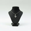 My Guru Ji silver plated brass Lord Ganesha pendant featuring fine detailing on a black display bust