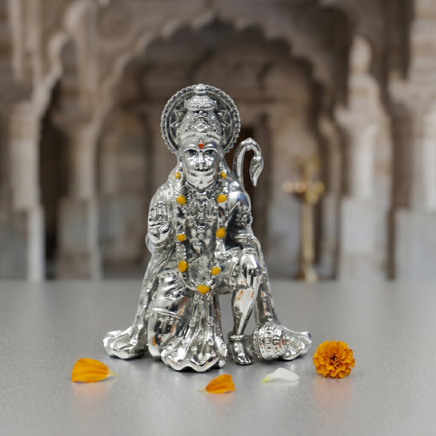 My Guru Ji silver finish brass Hanuman Ji idol in a sitting blessing posture for home temple and office decor.