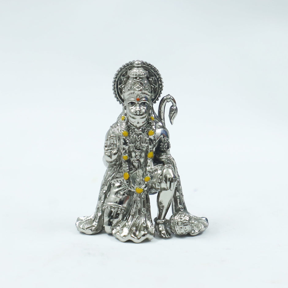 My Guru Ji silver finish brass Hanuman Ji idol in a sitting blessing posture for home temple and office desk decor.