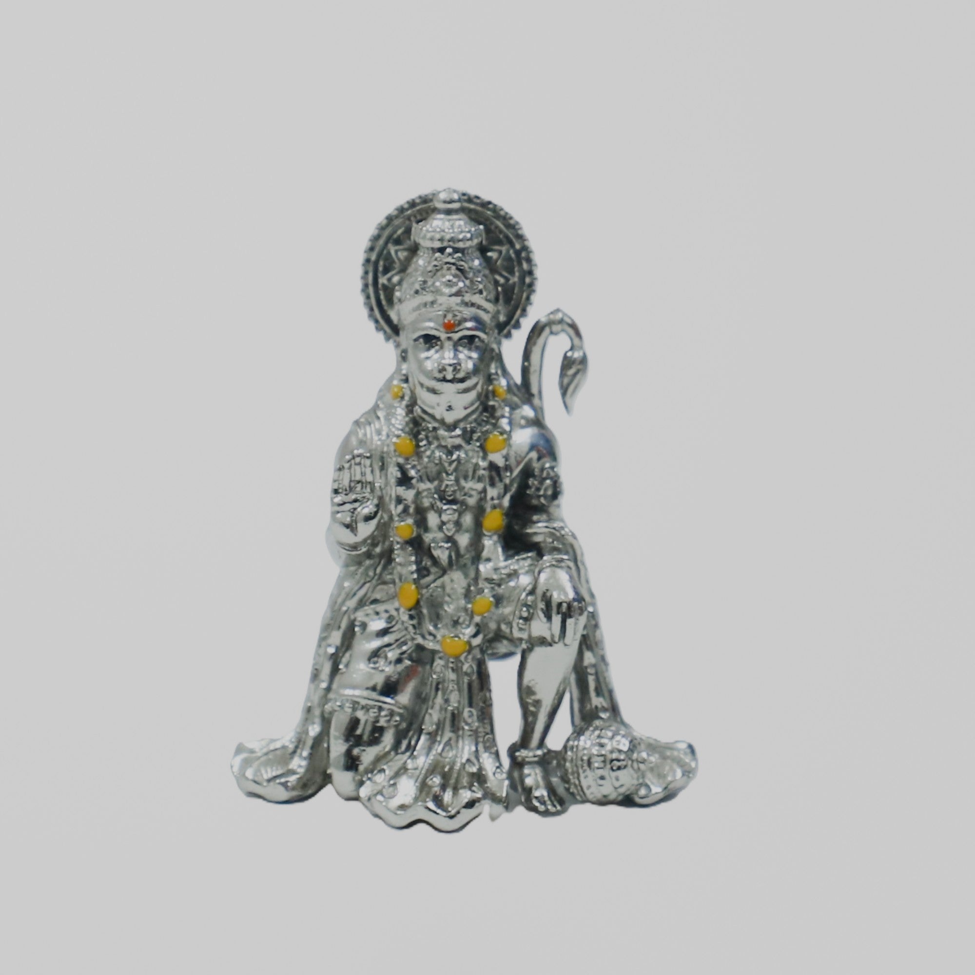 My Guru Ji silver finish brass Hanuman Ji idol in a sitting blessing posture for home temple or office desk decor.