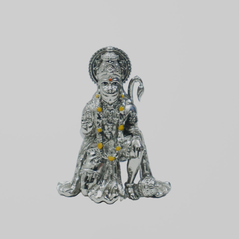 My Guru Ji silver finish brass Hanuman Ji idol in a sitting blessing posture for home temple or office desk decor.