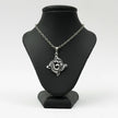My Guru Ji silver plated brass Om pendant featuring a traditional circular spiritual motif on a black display bust