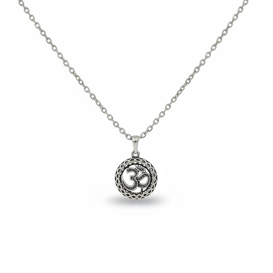 My Guru Ji silver plated brass round Om pendant featuring intricate sacred Aum symbol detailing on a delicate chain.